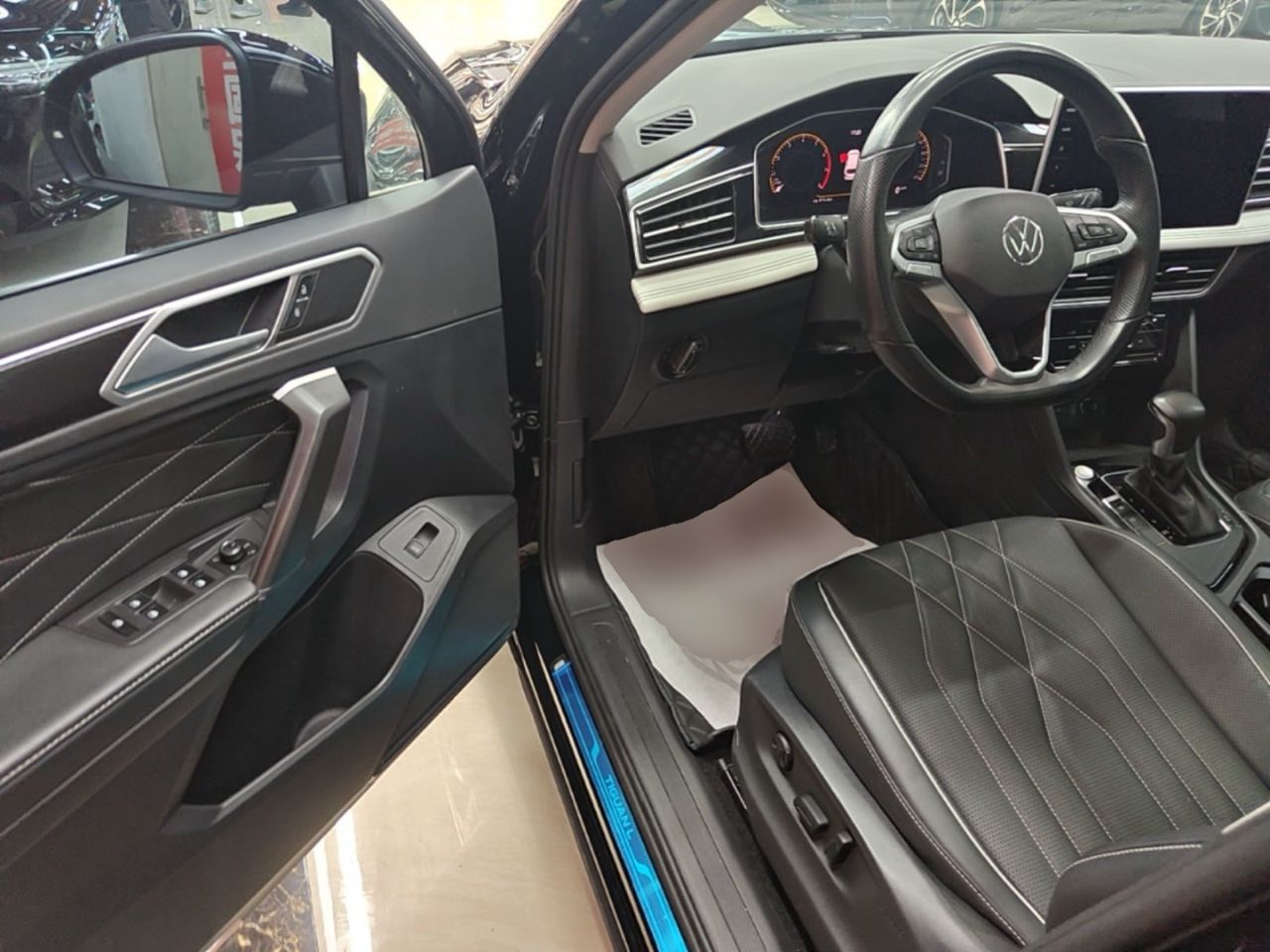 Порог и шильдик Tiguan L — габариты и оцинковка кузова